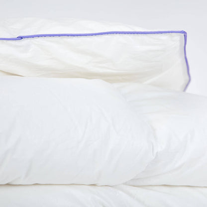 Luxury Austrian goose down duvet with purple piping detailing.